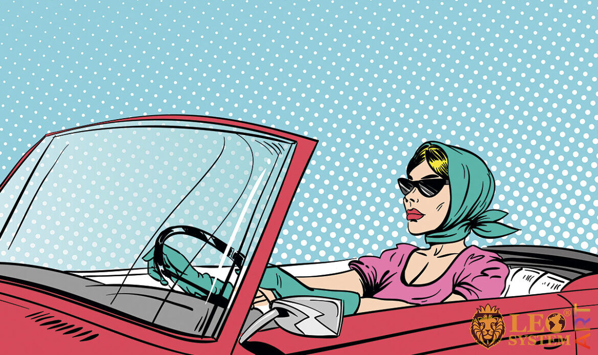 Picture of an attractive woman driving a car