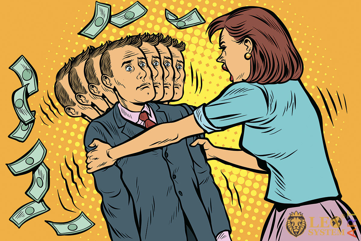 Picture of a woman shaking money out of a man
