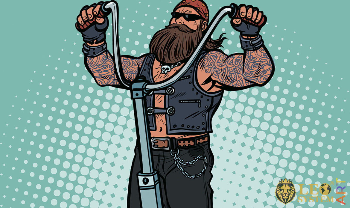 Picture of a bearded man with tattoos