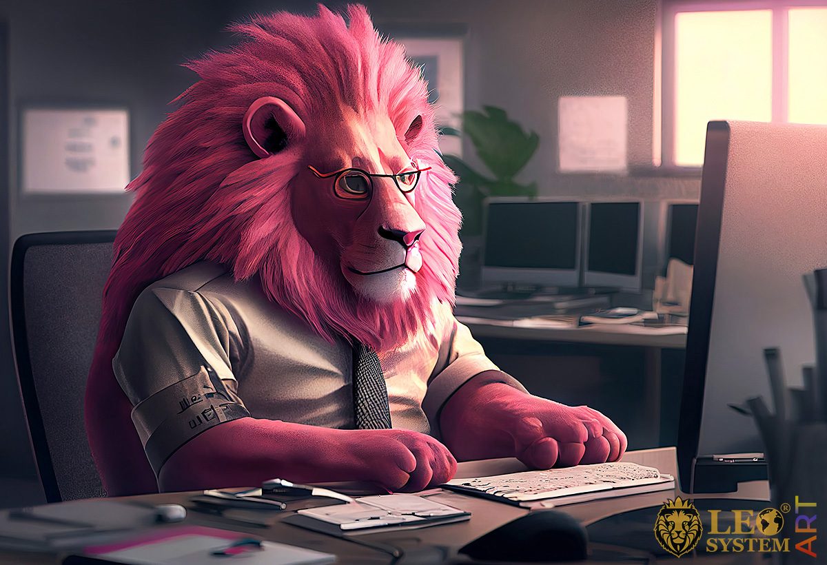 Big lion sitting at the computer