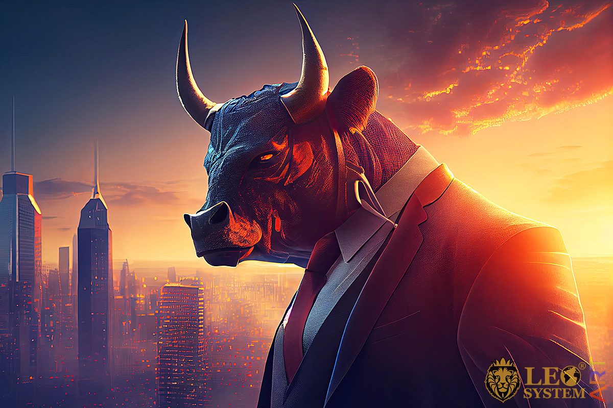 Man with the head of a bull at sunset