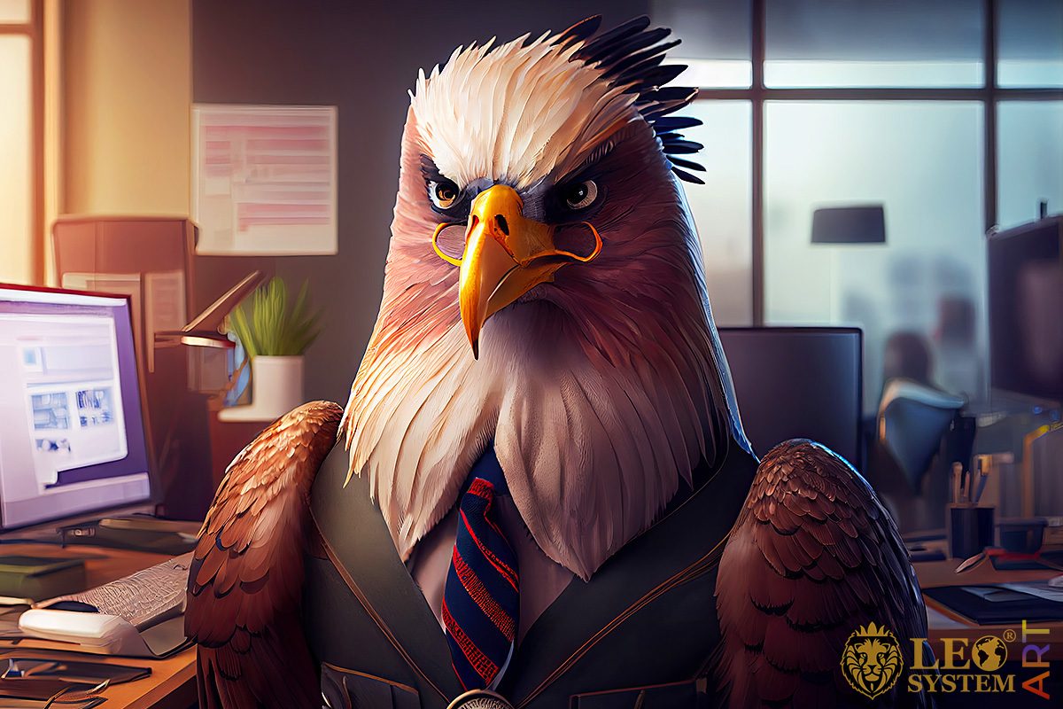 Picture with an eagle sitting at a computer